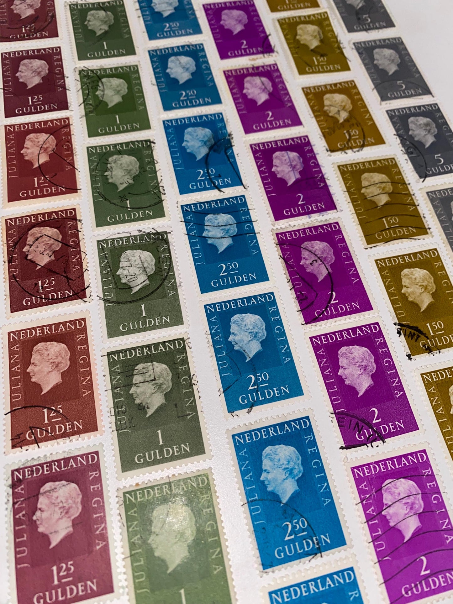 Post stamps from the Netherlands, mix of colors, queen Juliana, currency Gulden